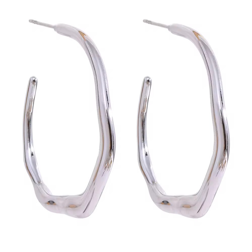 Silver hoop earrings on a white background