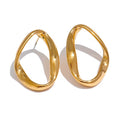 Gold hoop earrings on a white background